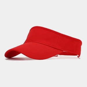 Macro detail of red sports sun visor fabric texture and streamlined side stitching