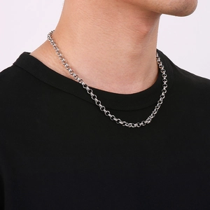 Unisex silver stainless steel rolo chain necklace with square tag on black shirt