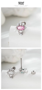 Detail of oval gemstone cartilage studs with pearls and screw back fastenings
