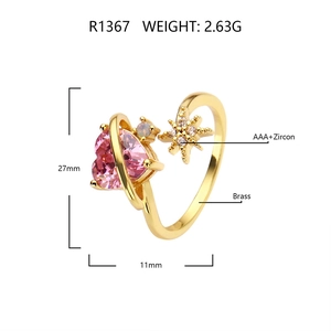 Detail view of 18k gold plated adjustable ring with pink heart zircon and star motif