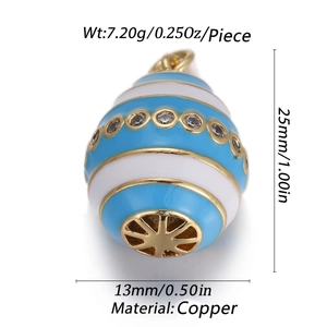 Detail view of gold-plated evil eye charm with blue enamel and crystal inlay measurements