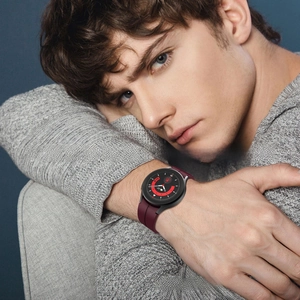Detail of burgundy silicone strap on wrist for Samsung Galaxy Watch 5 Pro