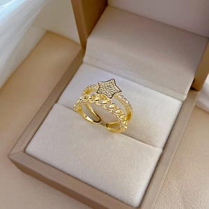 Gold-plated star ring with pavé zircons and double-layer band in jewelry box