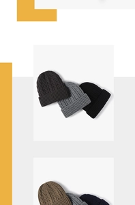 Detailed view of cable-knit textures on thick winter beanies in multiple colors
