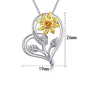 Detail view of heart sunflower pendant with 26mm height and 19mm width dimensions