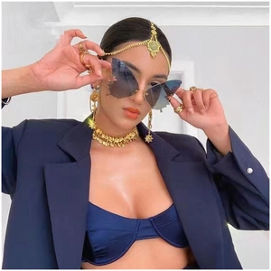 Fashion butterfly rimless sunglasses with blue gradient lenses and gold boho jewelry