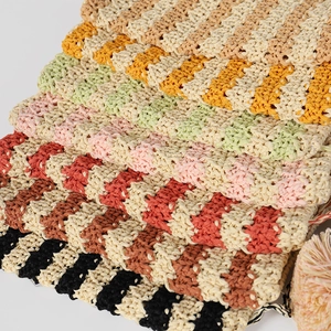 Close-up of colorful striped knit fabric with texture for handmade newsboy hats