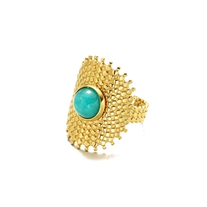 Golden stainless steel ring with turquoise natural stone and textured fan design