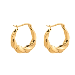 Detailed view of chunky golden twisted rope earrings with secure latch back closure