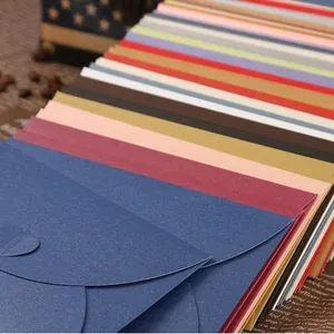 Colorful pearlescent paper envelopes with elegant arc closure for invitations
