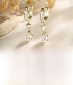 Detail of coffee gold drop earrings with cubic zirconia, 0.8mm needle and 10mm inner diameter