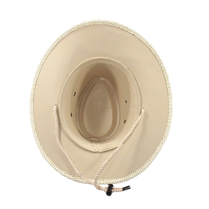 Detail of western straw cowboy hat interior with adjustable windproof drawstring and toggle