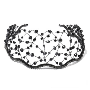 Detail of handcrafted bridal headband with black woven wire and faceted crystal beads