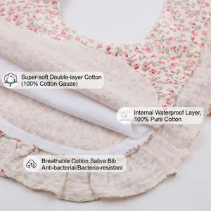 Floral cotton baby bib with ruffled edge and waterproof layer for toddlers