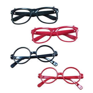 Flat lay of red and black square and round plastic eyeglass frames without lenses