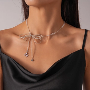 Elegant beaded bow necklace with heart pendant for women, stainless steel choker style