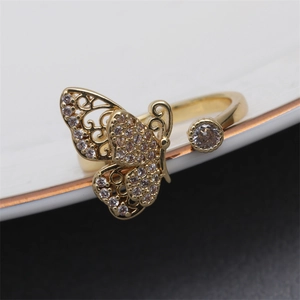 Adjustable golden butterfly ring with micro-paved zircons and hollow design