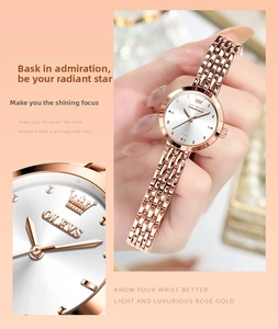 Detail of rose gold mesh strap watch with elegant silver sunray dial on woman's wrist