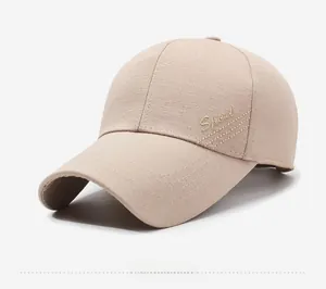 Detail view of khaki cotton baseball cap with Sport embroidery and reinforced stitching