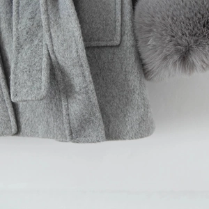 Grey hooded waist-tie cloak coat with faux fur cuffs and textured wool finish