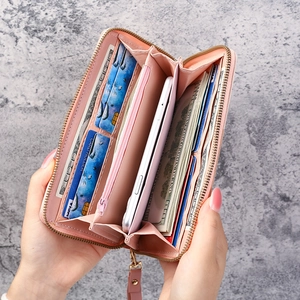 Pink faux leather long wallet with zipper closure and large capacity for cards and phone