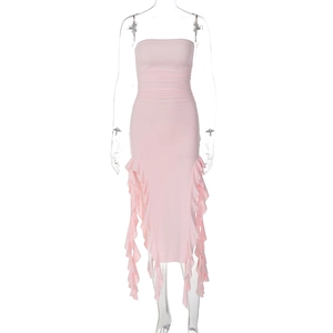Detail view of pink tube dress featuring asymmetric ruffled edges and slim-fit silhouette