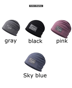 Unisex knitted slouchy beanies shown in gray, black, pink, and sky blue colors for winter.