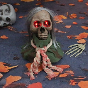 Animated Halloween skull ghost hanging prop with glowing red eyes and long hair