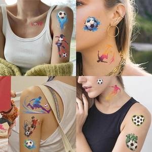 Detail of waterproof soccer tattoo stickers featuring players and football motifs on skin