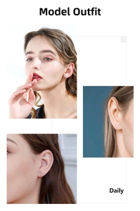Close-up of minimalist titanium steel stud earring with zircon stone on model ear