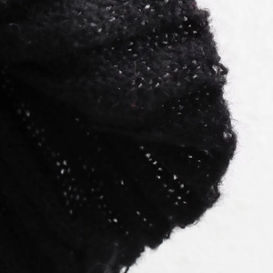 Slim fit black knitted dress with silver glitter yarn and elegant round neck detail
