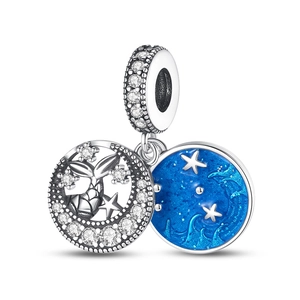 Silver celestial charm with blue enamel starry moon and star dangles for bracelets