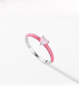 Close-up of heart-shaped pink crystal and pink enamel detail on S925 silver ring