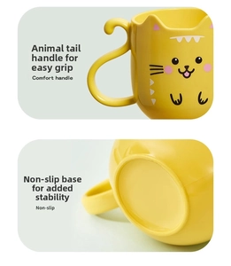 Detail of yellow cat mug showing ergonomic tail handle and non-slip bottom base