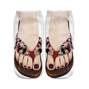 Detail of white ankle socks featuring 3D flip-flop print with pink flower straps