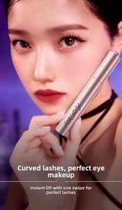 Waterproof mascara in rose gold tube showing curling and lengthening eye makeup effect