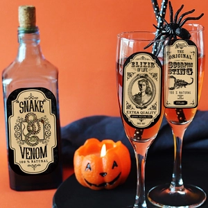 Vintage Halloween poison bottle labels set with snake venom and elixir designs on glassware