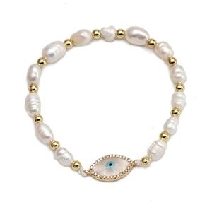 Detail of baroque pearl bracelet with gold beads and sparkling evil eye charm