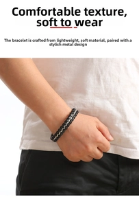 Close-up of vintage braided black leather bracelet with silver stainless steel metal chain