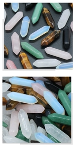 Variety of hexagonal double-pointed natural crystal columns in multiple gemstone colors