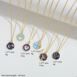 Vintage sun and moon enamel pendants on gold necklaces with detailed measurements