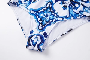 Detail of blue and white floral pattern with professional double-needle stitching