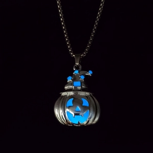 Luminous Halloween pumpkin pendant necklace with blue glowing wizard hat on black background