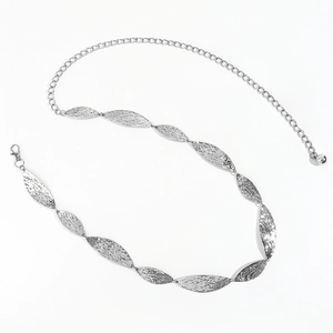 Detail of silver leaf-shaped metal links on a stylish waist chain with lobster clasp