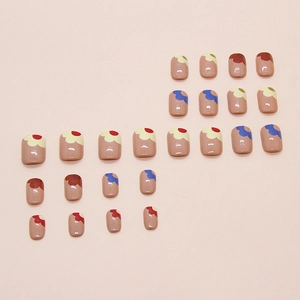 Short square press-on nails with colorful floral patterns on soft nude base color