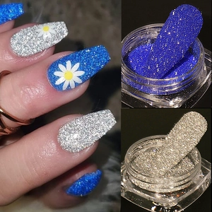 Polvere glitter riflettente blu e argento per unghie con decorazione floreale margherita