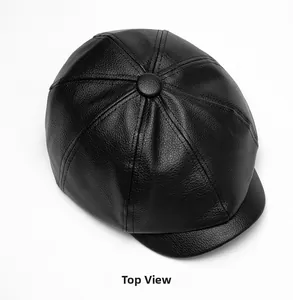 Top down view of black faux leather octagonal beret hat with pebble grain texture