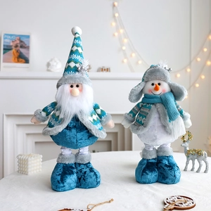 Detailed view of teal Christmas gnomes with knit patterns and plush textures