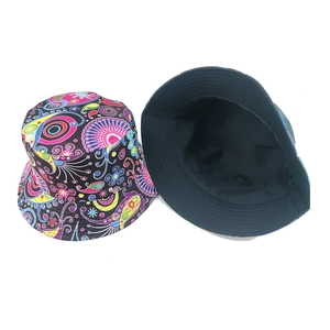 Detailed view of the Bohemian floral print and reversible black lining of this bucket hat