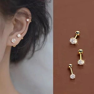 Three sizes of shiny gold stainless steel stud earrings with white cubic zirconia sets